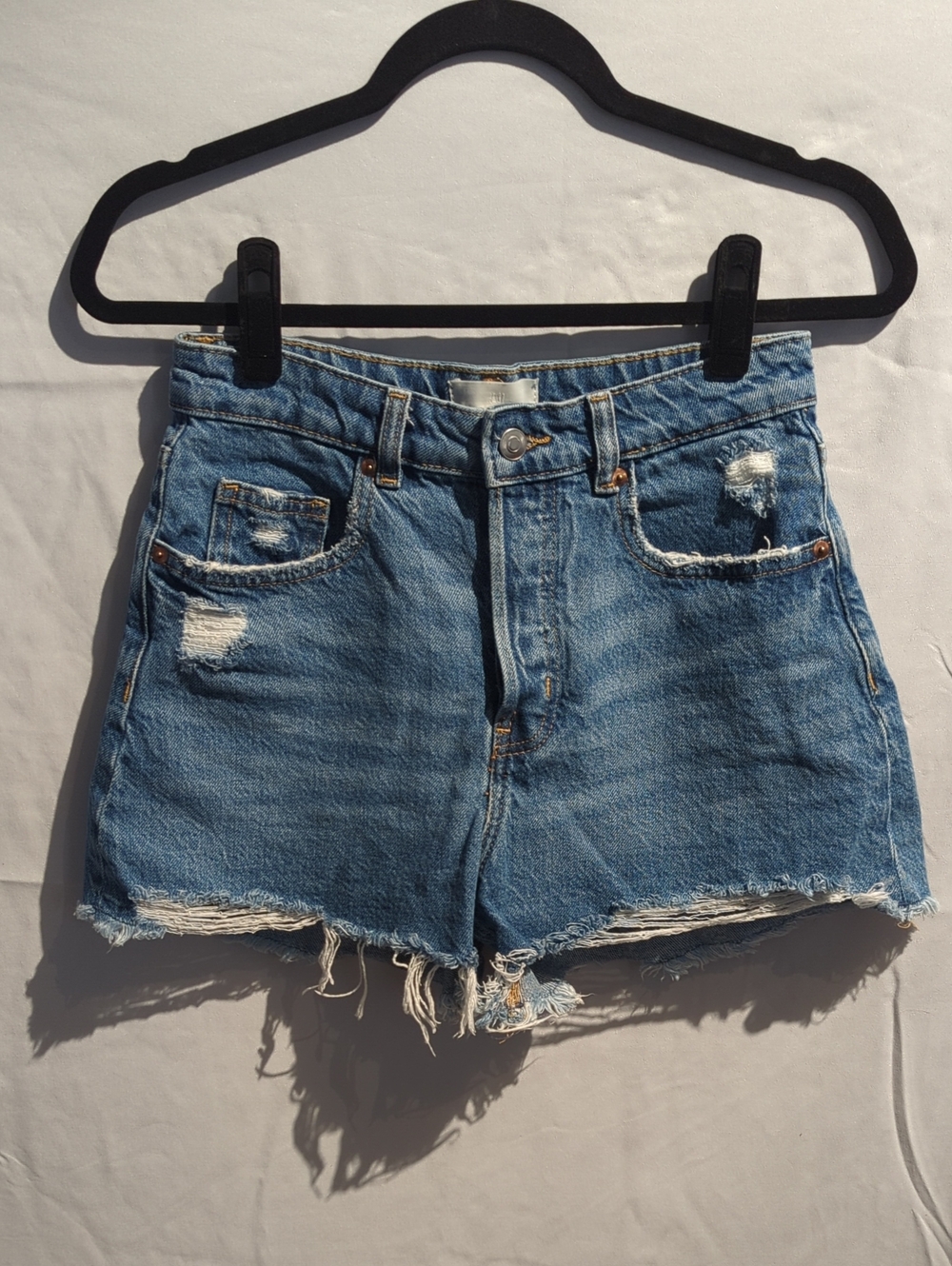 H&M High-Rise Distressed Blue Denim Shorts